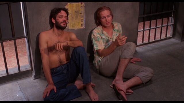 Raul Juila and William Hurt in Kiss of the Spider Woman, the 1985 film