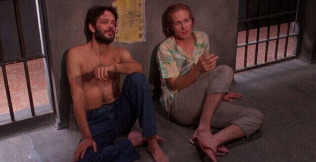 Raul Juila and William Hurt in Kiss of the Spider Woman, the 1985 film